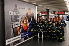 THW-Kampagnenposter in der U-Bahnstation St. Pauli.